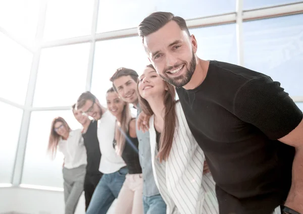 Young business team standing in the office — Stock Photo, Image