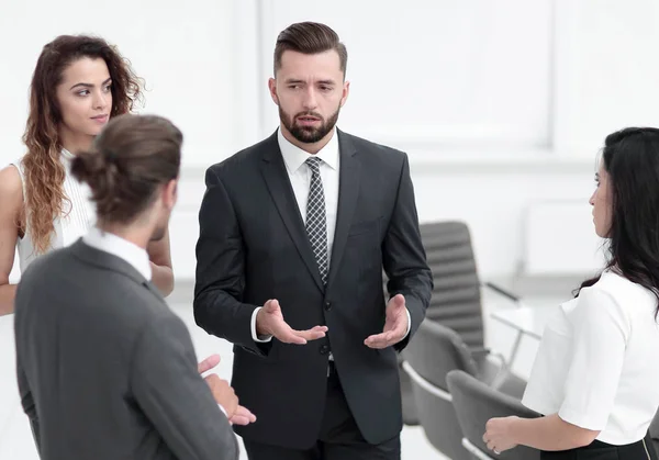 business people argue standing in office