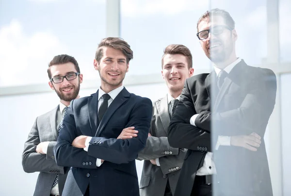 smiling employees standing together