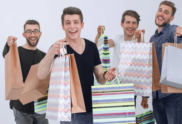 Jongeren vieren feest met pakketten in handen — Stockfoto