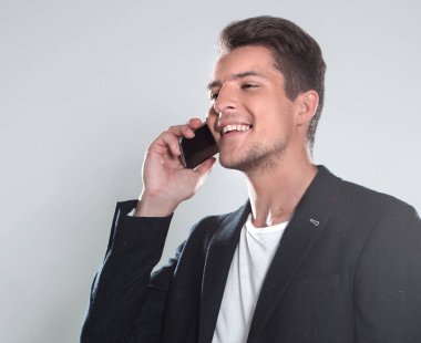 telefonda konuşurken bir ceketli genç çocuk