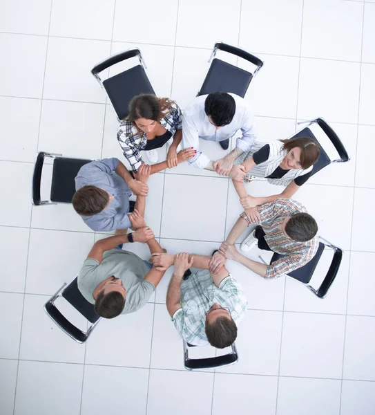 Top view.creative gruppo di lavoro piegato fuori delle mani del cerchio — Foto Stock