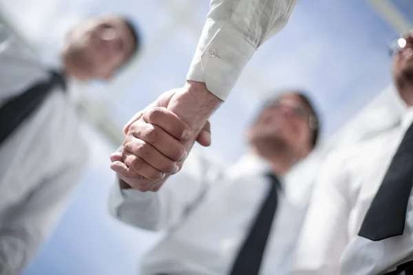 Business background.handshake parceiros de negócios — Fotografia de Stock