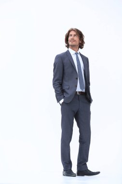 Dalgın iş adamı yukarı bakıyor.