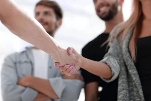 Close-up Shaking Hands.Man and woman