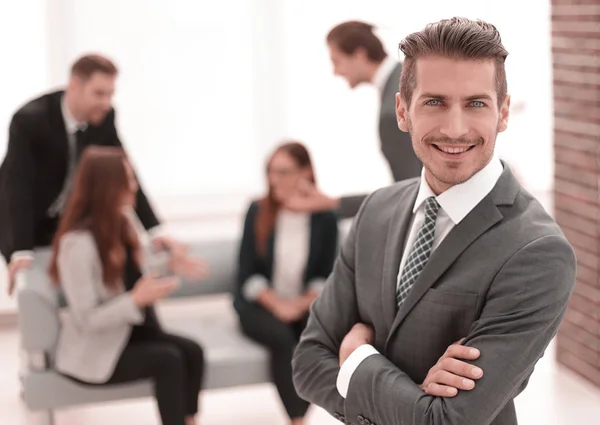 Young man in business suit smiling — Stock Photo, Image
