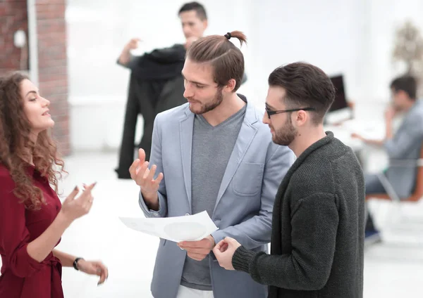 group of colleagues discussing new proposals