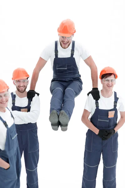 Trabajador de la construcción sentado en los hombros de sus colegas —  Fotos de Stock