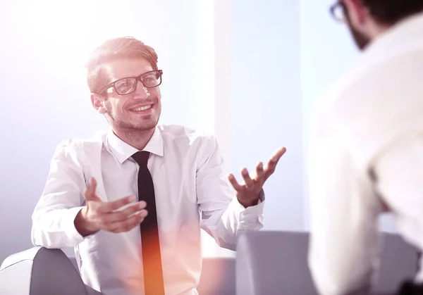 Businessman explaining something to his colleague — Stock Photo, Image