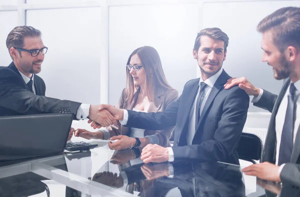 Young boss with employees during business meeting — Stock Photo, Image
