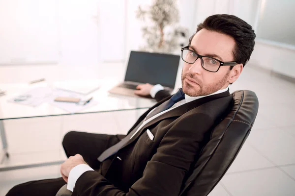 responsible businessman sitting at his Desk