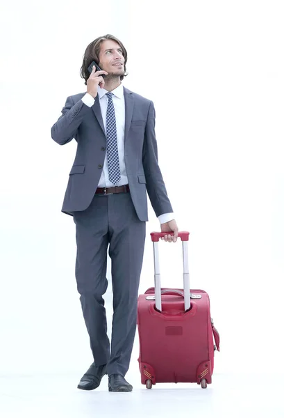 Successful businessman with travel suitcase — Stock Photo, Image