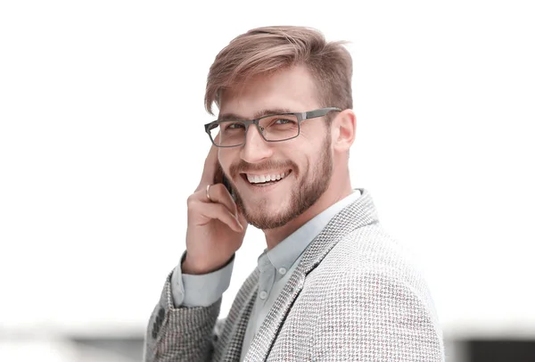 Close up.smiling businessman talking on smartphone — Stock Photo, Image
