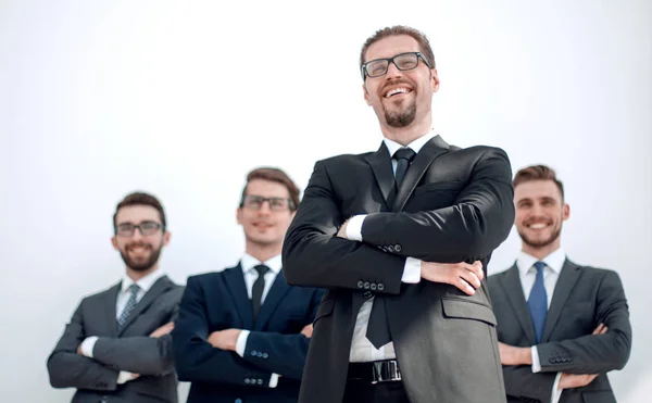 Uśmiechnięty mężczyzna biznesu, stojąc przed zespołu business — Zdjęcie stockowe