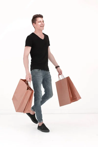 Beau homme dans un T-shirt noir avec un sac — Photo