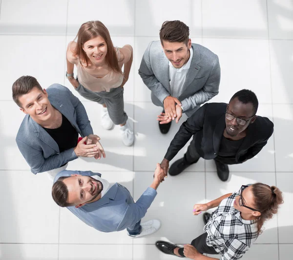 Top view of multiracial young creative people in modern office — Stock Photo, Image