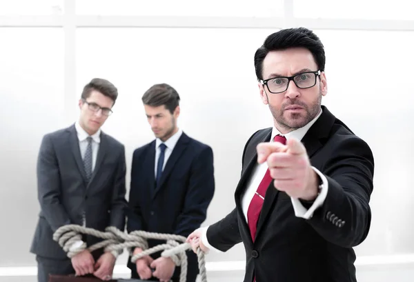 Boss is holding related employees and pointing the finger at you — Stock Photo, Image