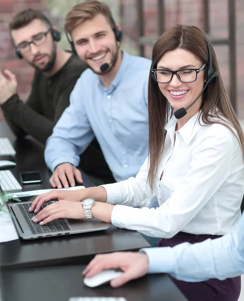 Close up.young call center staff sitting at the Desk — Stock Photo, Image