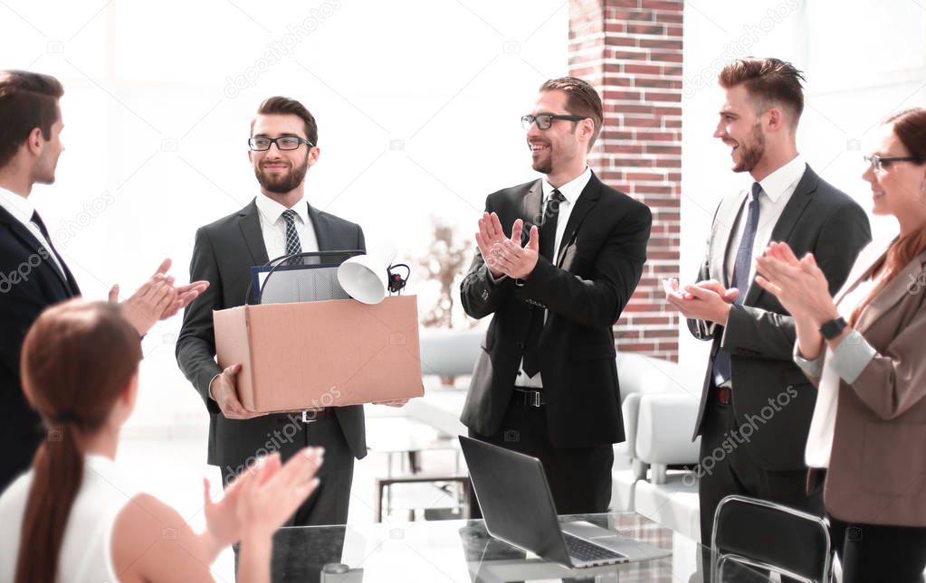 business group welcomes the new employee with applause