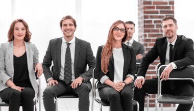 Grup çekici işadamları bahsediyoruz gülüyor ve oturan şaka