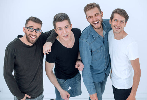 top view..a group of happy young men looking at the camera