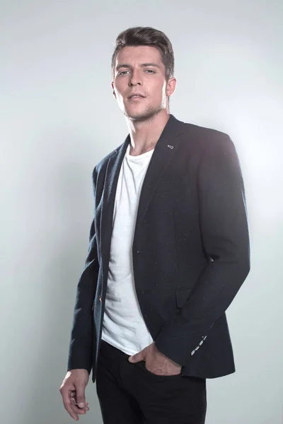 Studio portrait of a serious young man in suit — Stock Photo, Image