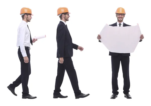In full growth .a qualified architect in an orange helmet — Stock Photo, Image