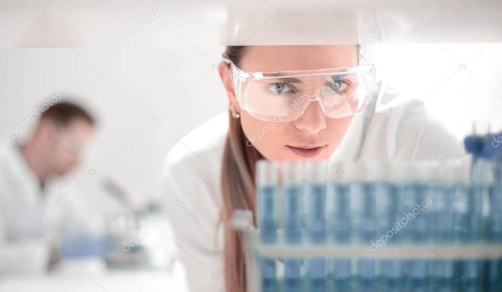 close up.scientist doing research in clinical laboratory.