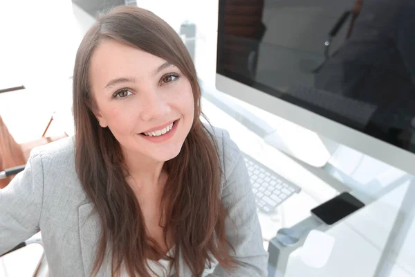 modern business woman sitting at her Desk.