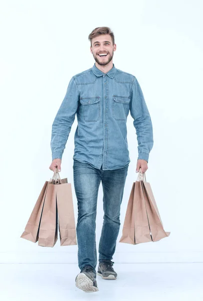 Photo d'un bel homme avec des sacs à provisions — Photo