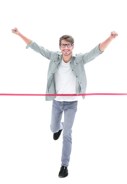 Feliz hombre de negocios corriendo a través de la línea de meta. Aislado sobre blanco — Foto de Stock