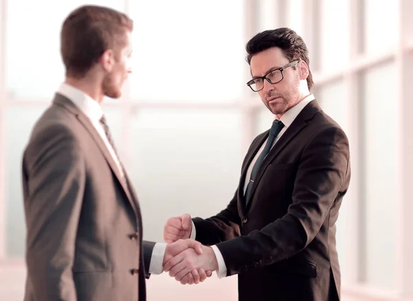 Friendly handshake of business partners — Stock Photo, Image