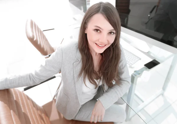 modern business woman sitting at her Desk.