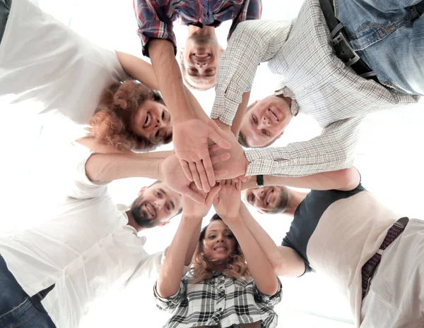 Equipo de negocios con las manos juntas — Foto de Stock