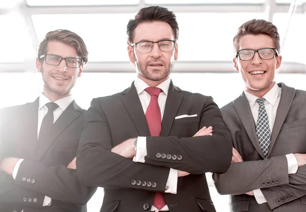 Bottom view.three smiling business partners — Stock Photo, Image