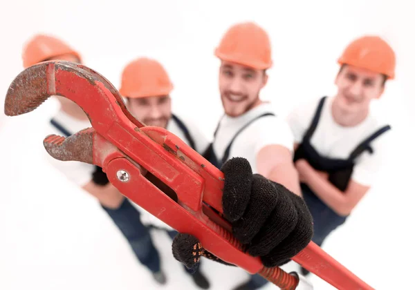 Vista do top.group de construtores mostrando uma chave de gás . — Fotografia de Stock