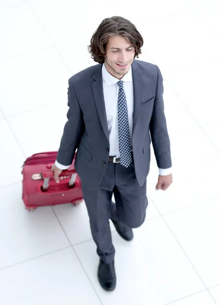 Biznesmen z .isolated bagażu na białym. — Zdjęcie stockowe