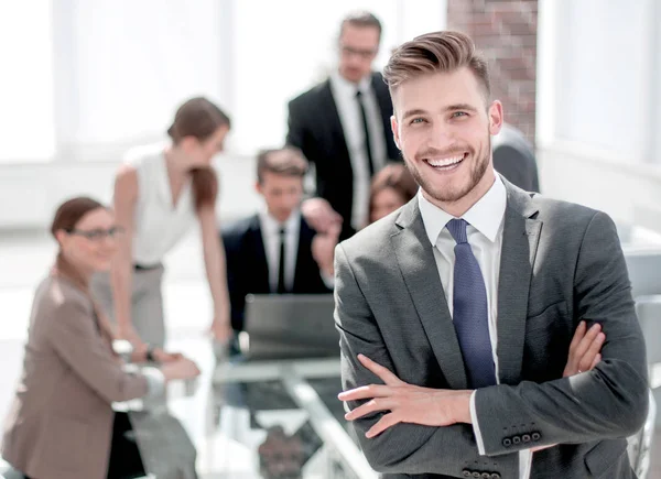 Successful businessman standing in the Bank office — Stock Photo, Image