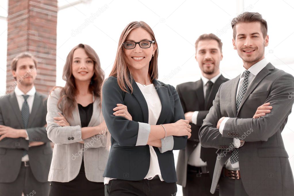 Portrait Of Young Businessman With Business Team