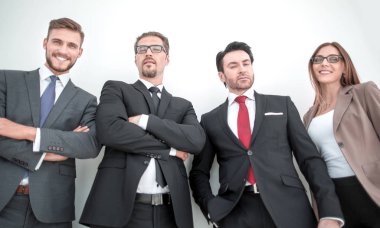 Takım ayakta beyaz bir arka plan karşı birlikte ticaret