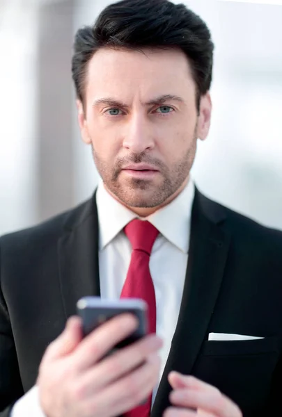 close up.businessman is typing SMS