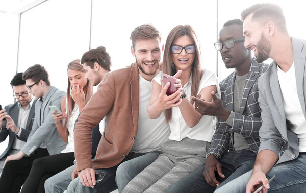 group of young people discussing new information