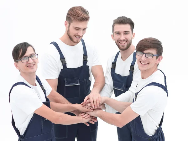 Equipe de movers juntando as mãos . — Fotografia de Stock