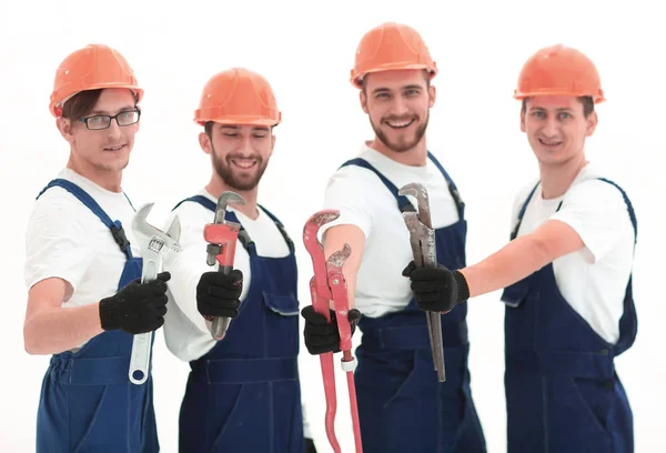 Group of plumbers with working tools — Stock Photo, Image