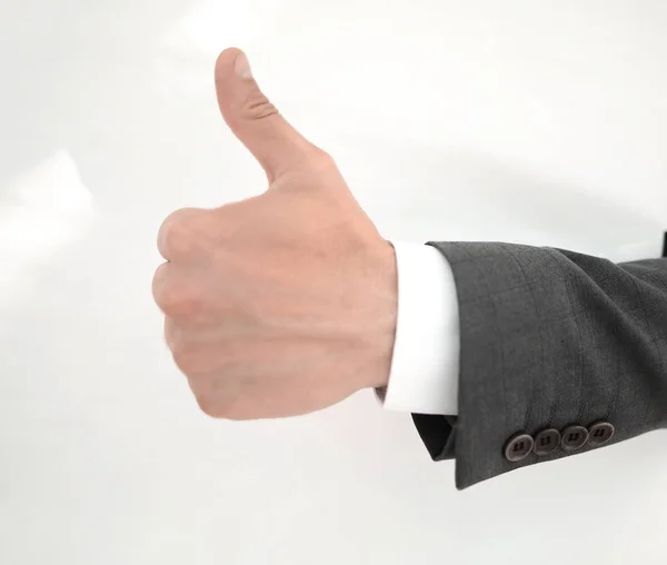 close up.businessman showing thumb up