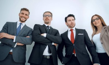 Takım ayakta beyaz bir arka plan karşı birlikte ticaret