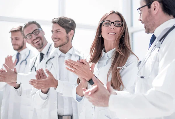 Group of successful doctors applauds — Stock Photo, Image