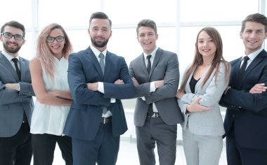 yakın çekim. başarılı iş takım ayakta birlikte