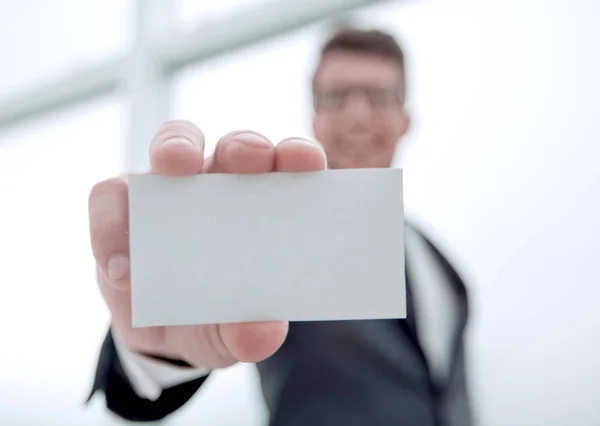 Businessman showing a blank business card — Stock Photo, Image