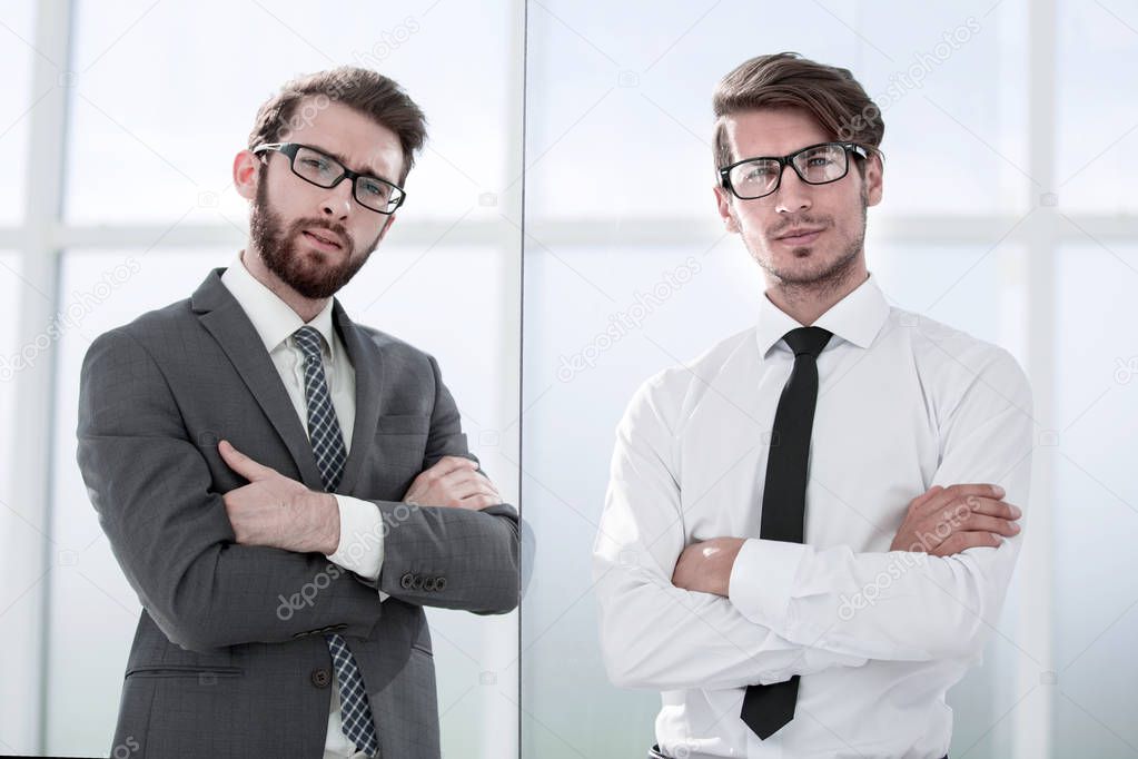 two business people standing in the office